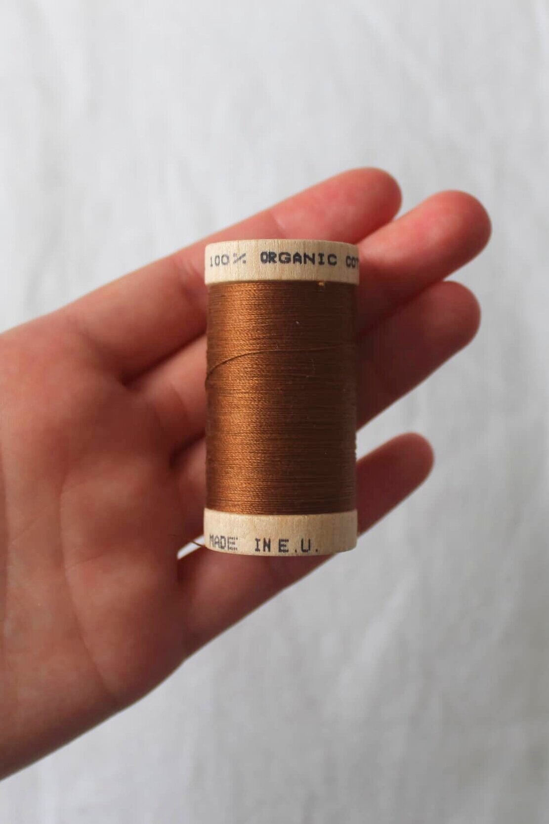 scanfil 100% organic cotton thread wooden reel 100m tan #4827