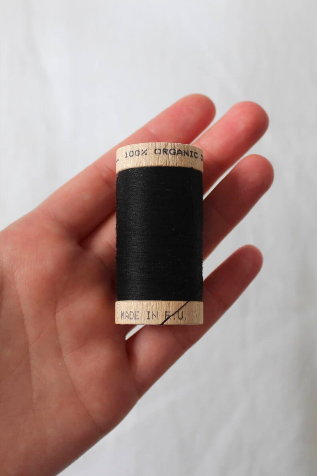 scanfil 100% organic cotton thread wooden reel 100m black #4808